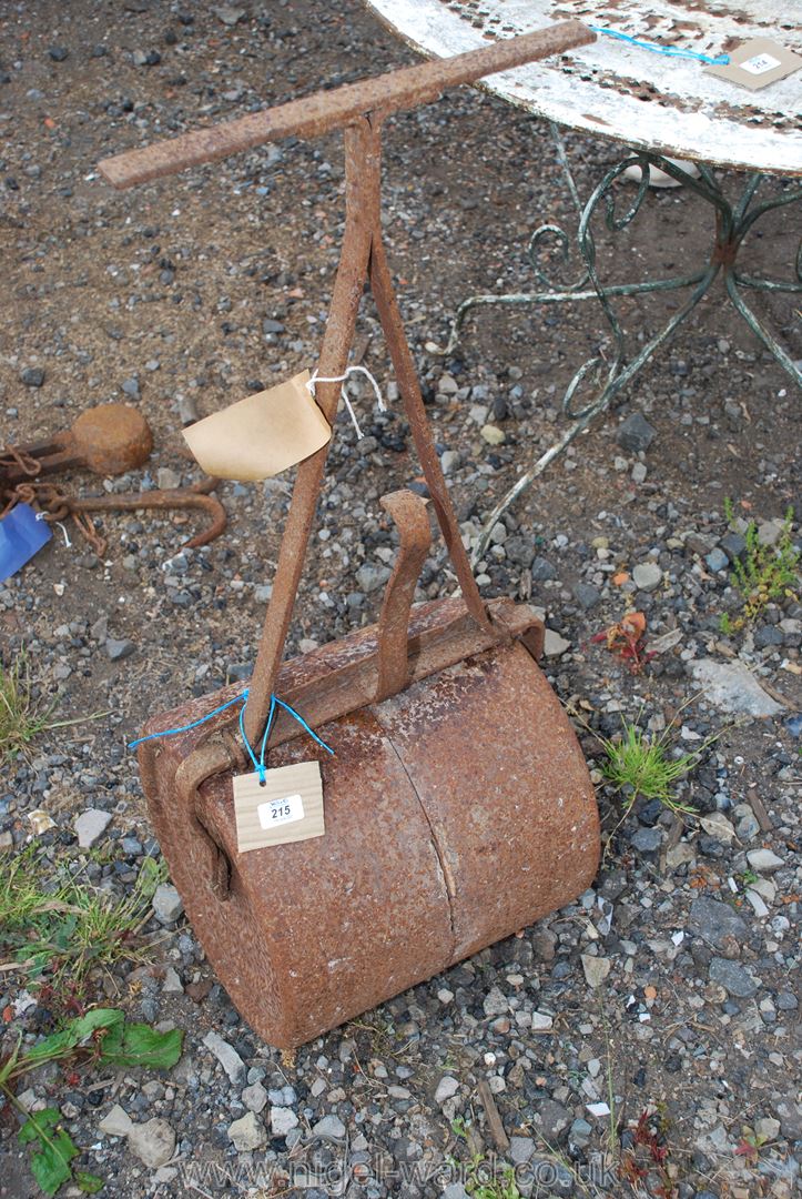 A small hand Garden Roller, 13'' x 12'' diameter.