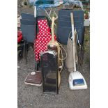 Two electric vaccums, carpet sweeper, fire guard and shopping trolley.