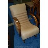 A low bentwood rocking chair.