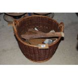 Wicker log basket and contents.