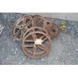 Six cast iron wheels, 13'' and 11''.