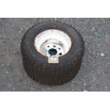 A quad tyre on a four stud rim.