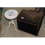 A domed top box and metal stool.