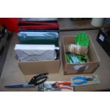 A box of unused A4 binders and stamp stock sheets, new garden shears, garden equipment etc.