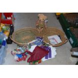 Two large wicker tray baskets, a teddy called Winston and some linen.