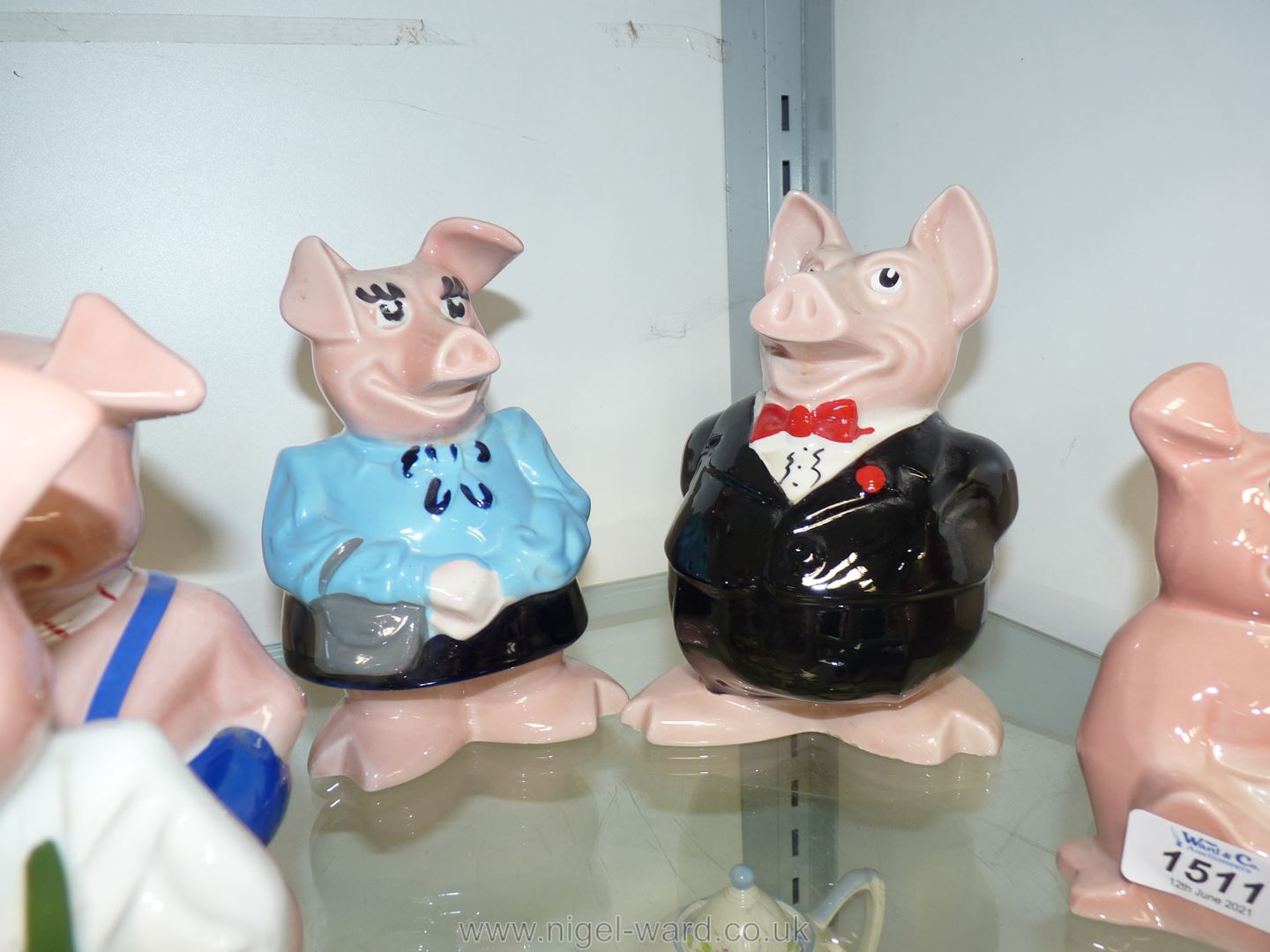 A family of Wade Nat west piggy banks. - Image 2 of 2