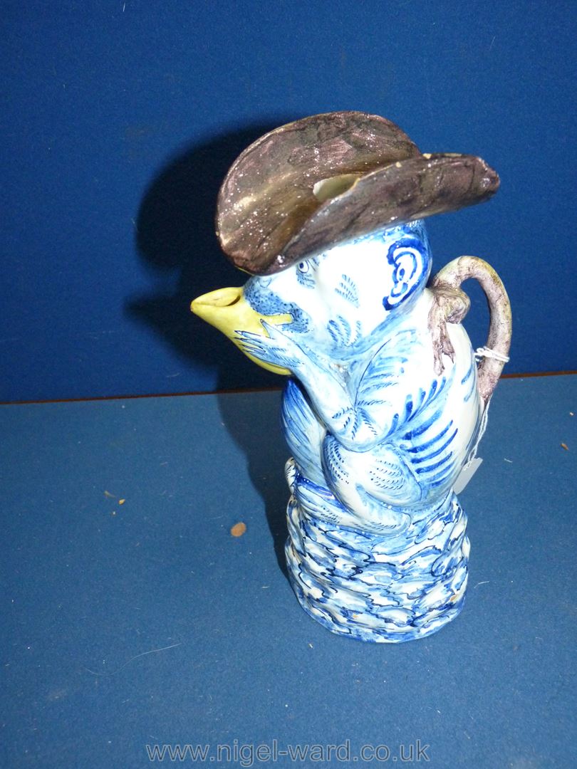 An antique Dutch Delft character jug in the form of a Monkey, 19th c. signature to base, 8'' tall. - Image 2 of 4