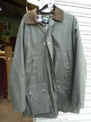 A Hoggs waxed Coat in green with check lining, size 3XL.