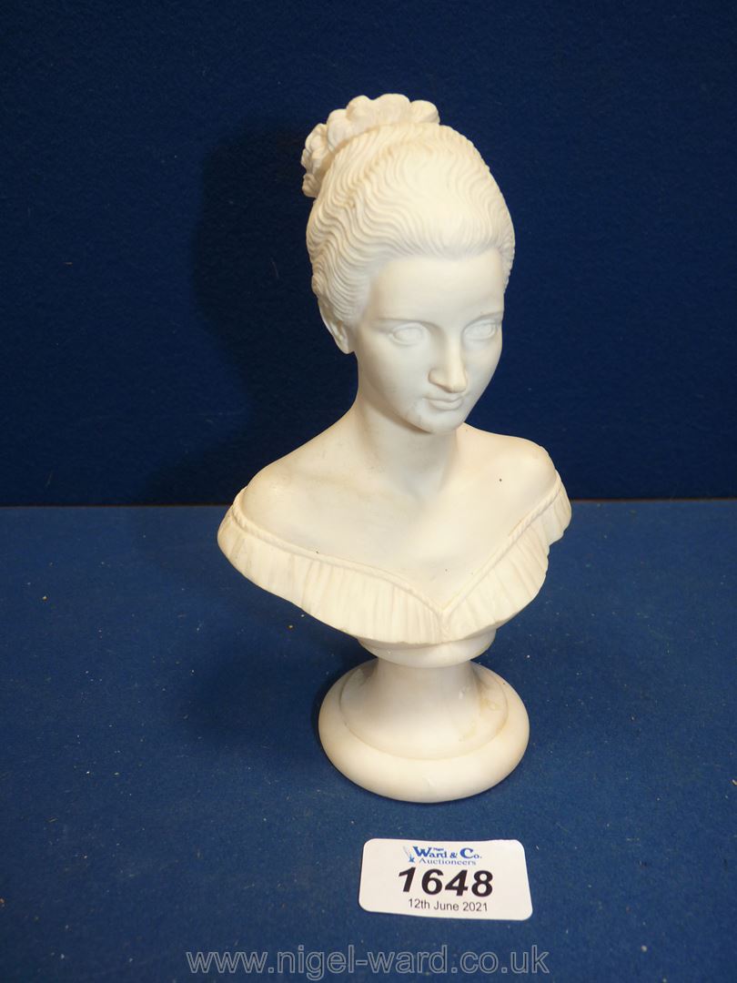 A Giannelli sculpture of a bust of a Lady, on plinth, signed and dated 1985, 7'' tall.