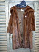 A Fur Coat by J. Marks & Sons, Birmingham, size medium, lining a/f.