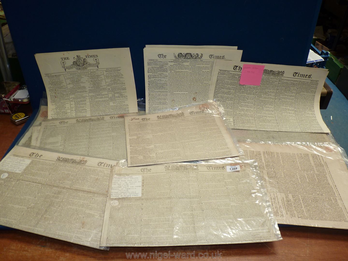 A quantity of old newspapers including The Times, June 12th 1809, 'The Daily Universal Register',