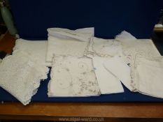 A box of antique/vintage lace and linen items.