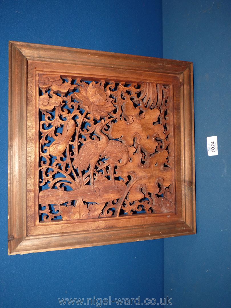 A highly decorative hardwood Carving, 14 " x 14" approx.