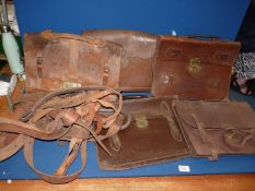 A box of five vintage leather briefcases, good quantity of leather straps, etc.