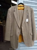 A pair of Magee tweed trousers in brown and yellow,
