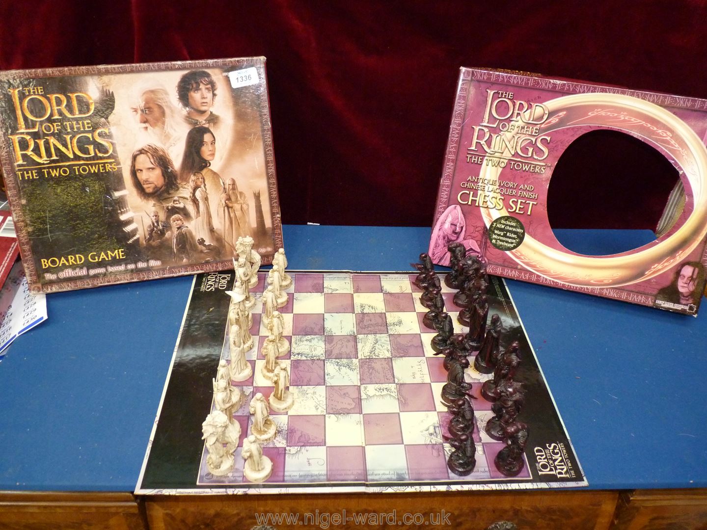 Lord of The Rings: a boxed chess set and Two Towers board game.