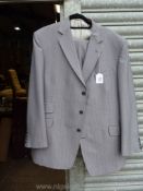 A tailor made to measure silvery blue pale pinstripe Suit with silver silk lining, single breast,