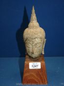 An old Thai Buddha head, mounted on wood stand, head 7'' tall ,