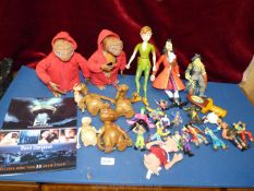 A box of characters from animated films including ET, Peter Pan and Captain Hook (x2).