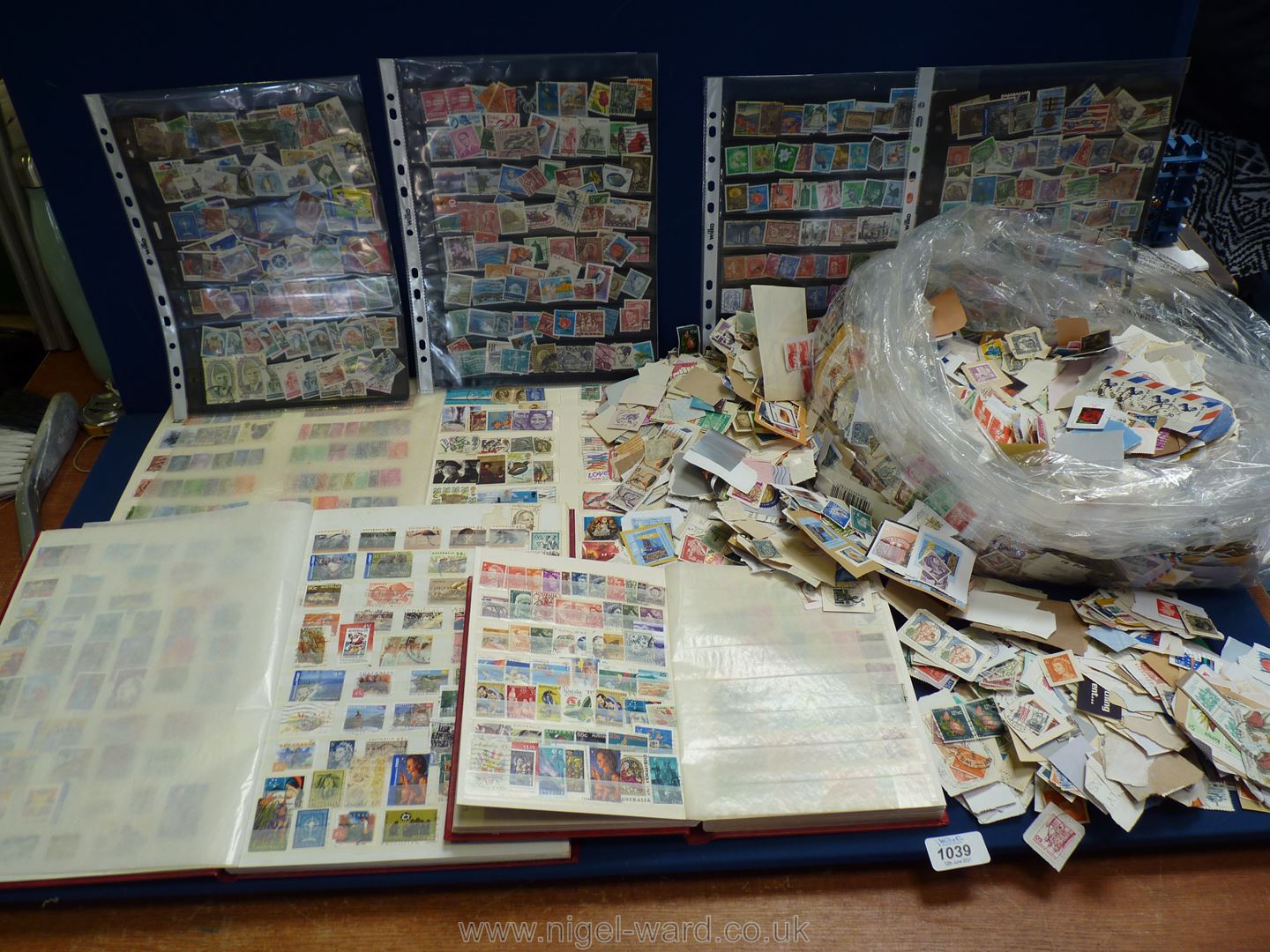 A quantity of stock books filled with English and foreign stamps and a large quantity of loose