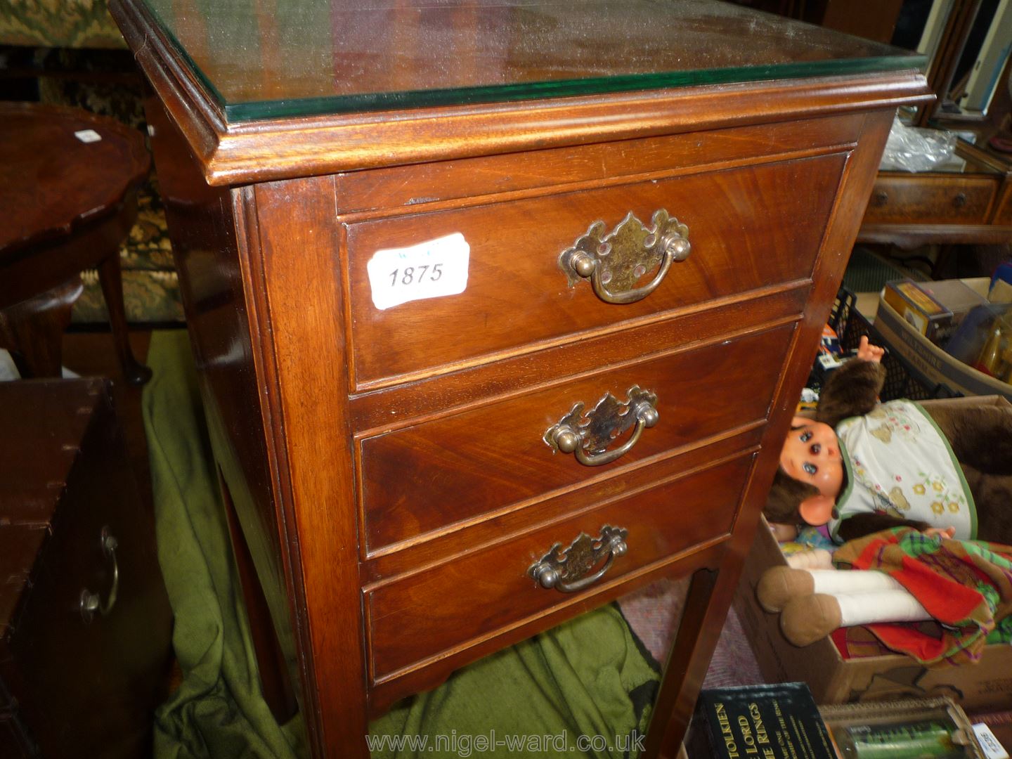 A Bedside night Stand having three short drawers and standing on square legs with moulded corner - Image 2 of 3