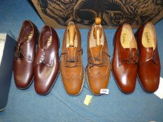 A box of gent's shoes including Loakes, size 10 1/2 with stretchers and size 10, brand new,