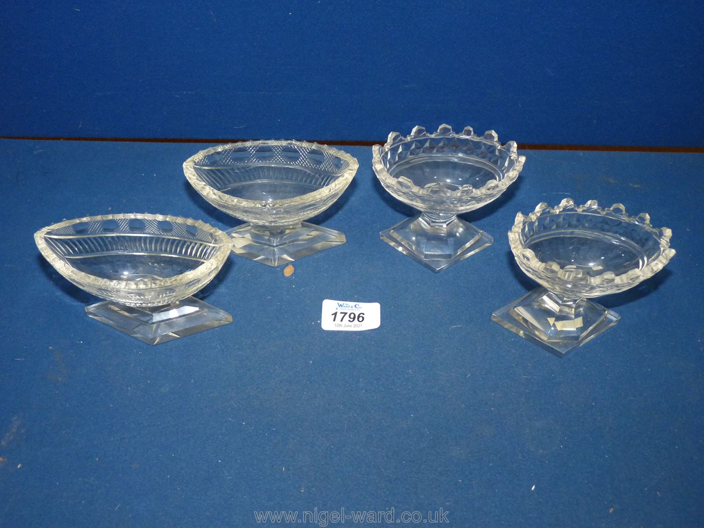 A good pair of Regency cut glass boat shaped salts finely cut in the Irish style and with