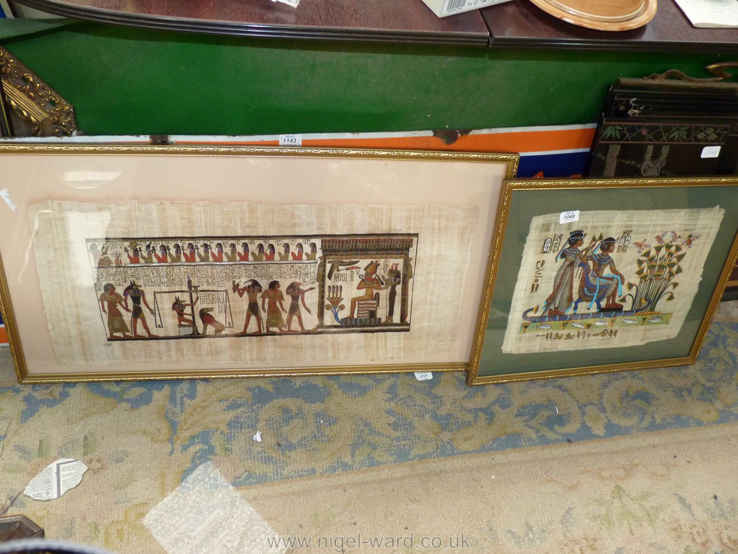 Two framed Papyrus pictures of Egyptian scenes, image sizes 17'' x 13'' and 31'' x 13 1/2''.