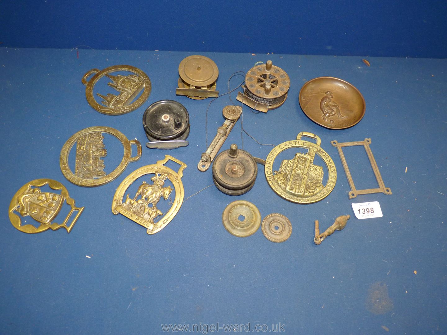 A quantity of miscellanea including fishing reels, horse brasses, Bowling dish, etc.