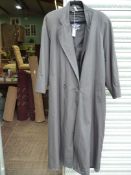 A gent's Austin Reed black trench coat size 14R.