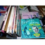 A plastic box of classical L.P's including Mantovani, Magic strings by Norman Candler, etc.