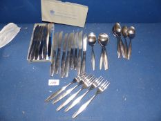 A quantity of modern Mappin & Webb stainless steel cutlery plus two forks in exactly the same