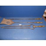 A good set of early Victorian fireside implements, steel with cast brass handles.