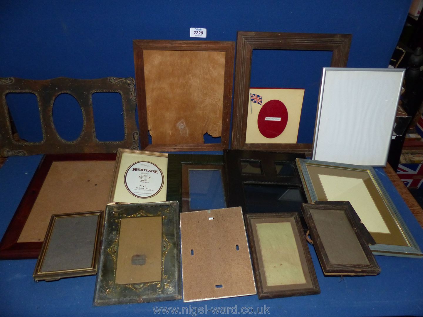A box of wooden and other period frames.
