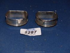 Apair of silver napkin rings, Birmingham 1954, H.