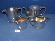 A Walker & Hall, Sheffield four piece plated Teaset comprising teapot, hot water pot,
