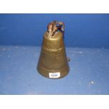 A large brass Cow Bell with chain, 8'' tall.