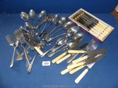 A box of plated cutlery including bone handled knives.