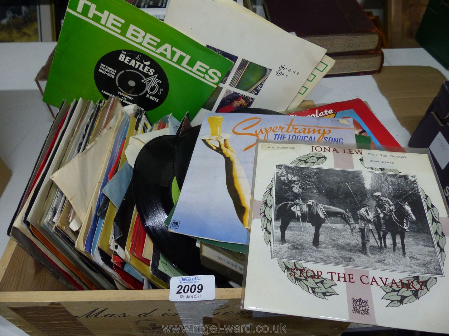 A quantity of 45 rpm records including Hot Chocolate, Gary Numan, Supertramp, etc.