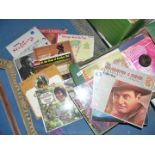 A box of LP records including Richard Clayderman, Cliff Richard, etc.