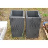 Two woven effect plastic garden planters, 25'' high.