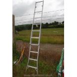 Extending convertible step ladder.