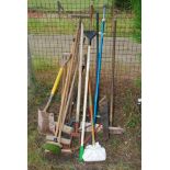 Quantity of garden brooms, wood saw,