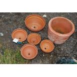 Six various terracotta garden planters