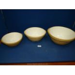 A trio of T.G. Green mixing Bowls, 13", 10 3/4" and 9".