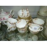 A part Royal Crown Derby Teaset including six cups, six saucers, six tea plates,