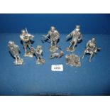 Six silver plated Royal Hampshire figures to include; busker, cobbler, Shepard dog, etc.