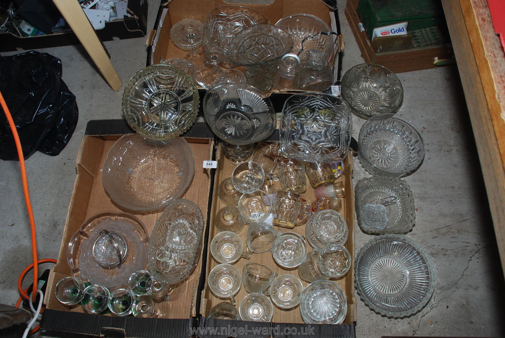 Three boxes of glassware, including trifle bowls, punch bowl and associated cups,