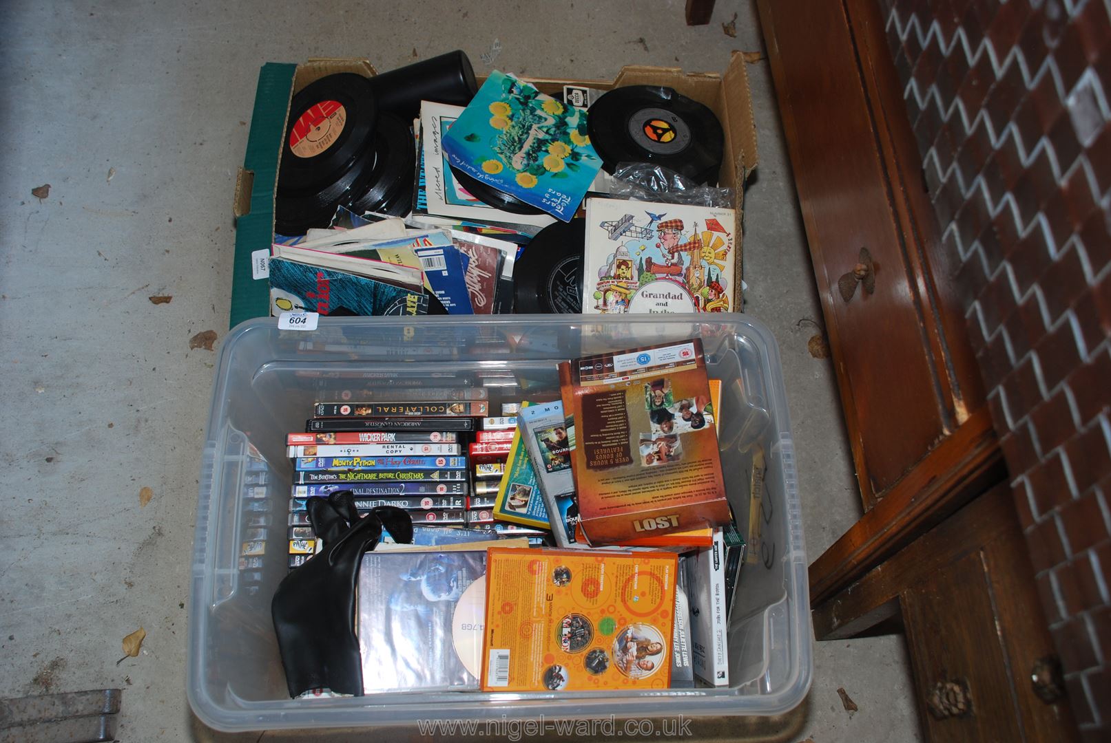 Tub of various DVD's and box of 45 rpm records