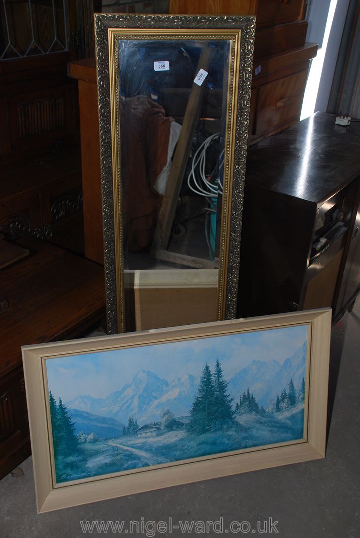 Beveled mirror and an alpine print